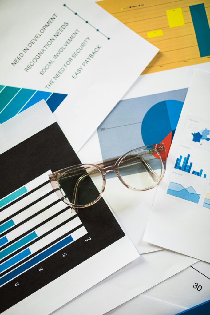pexels-photo-7948086-7948086 Eyeglasses resting on business charts and documents, ideal for financial analysis themes.